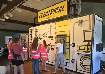 Students gathered around the electrical station